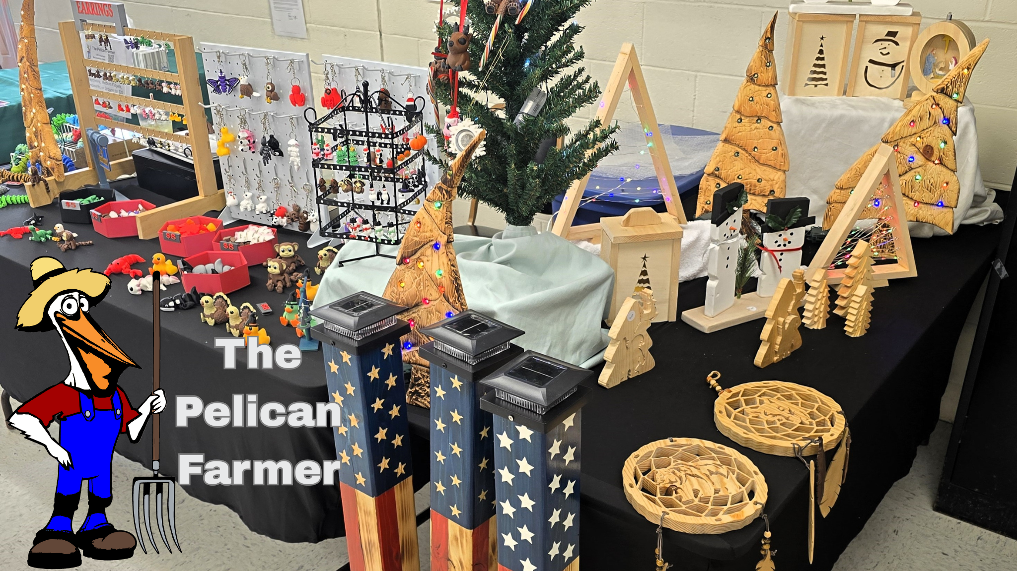 Table with various items including a Pelican Farmer logo, decorative flags, and wooden objects.